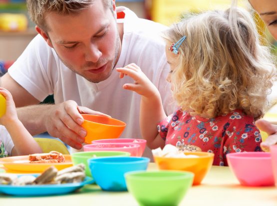 bigstock-Man-with-children-playing-toge-27386318